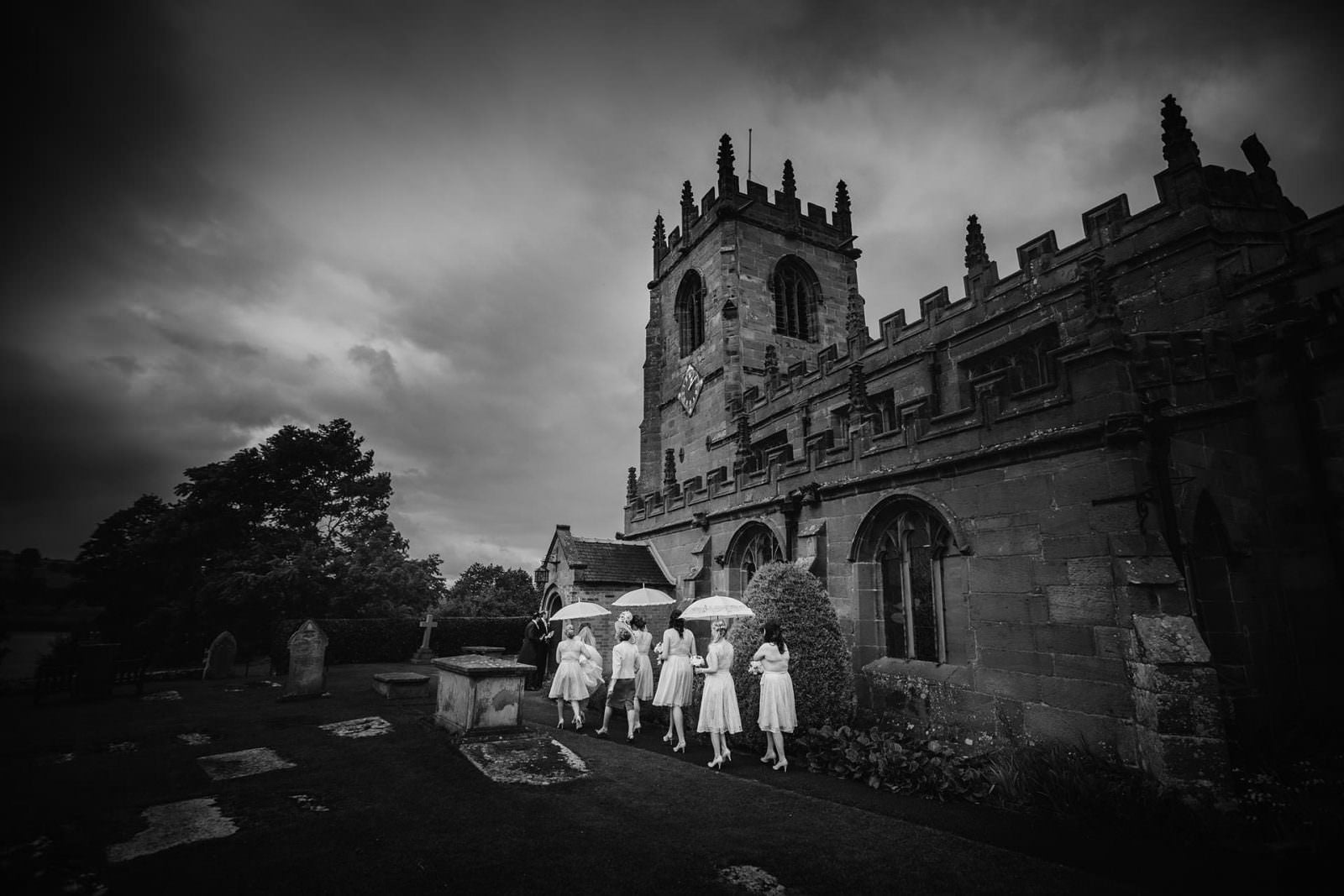 Shropshire Documentary Wedding Photographer with bridal party at Church