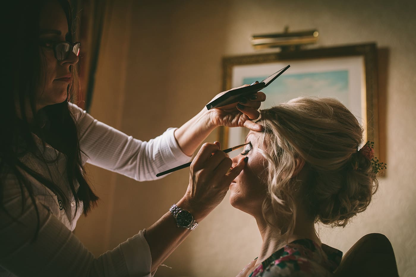 Shropshire Wedding Makeup Artist Applies make up to bride