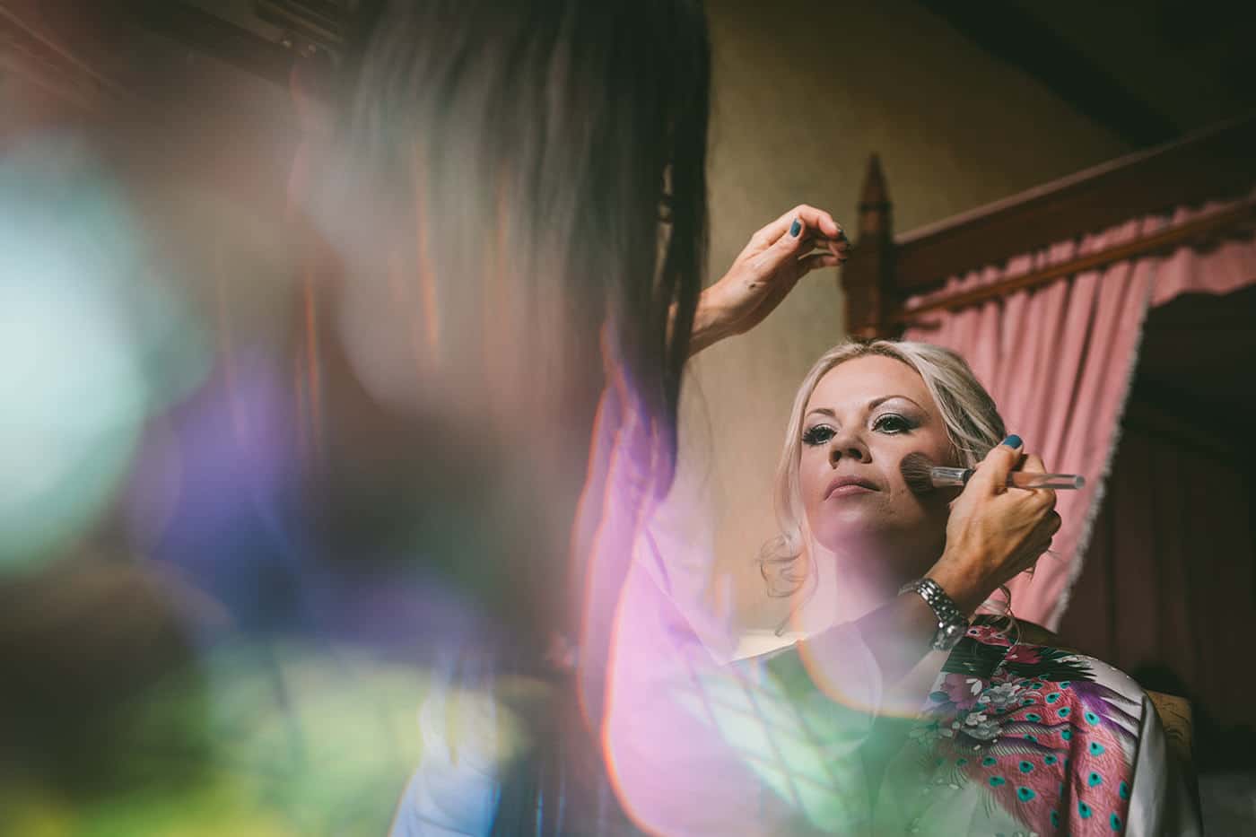 Shropshire Wedding Makeup Artist Applies make up to bride