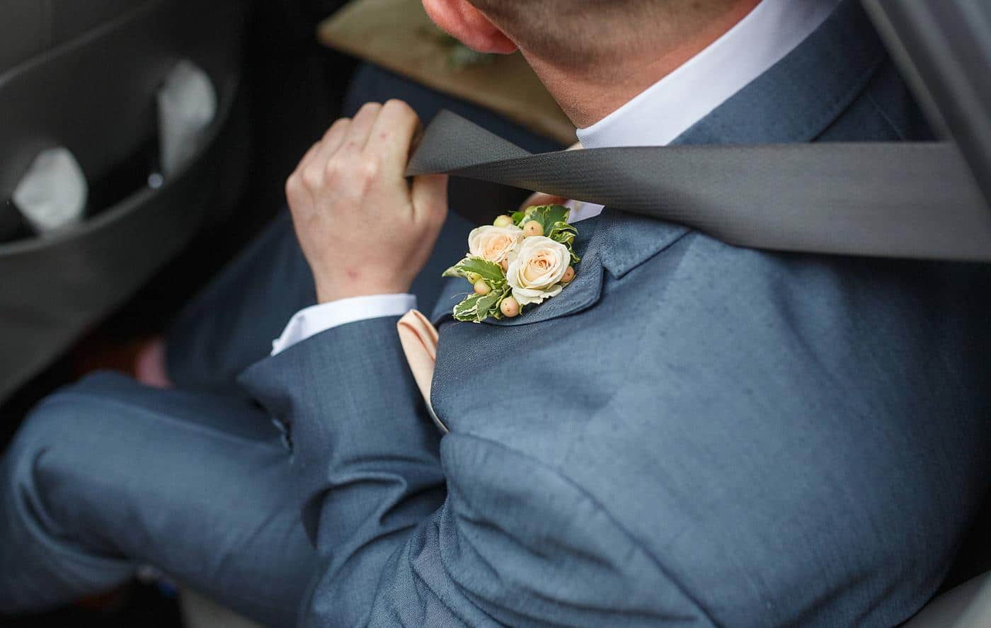 the grooms button hole flower