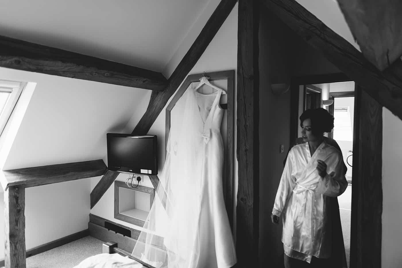 bride comes to get her wedding dress