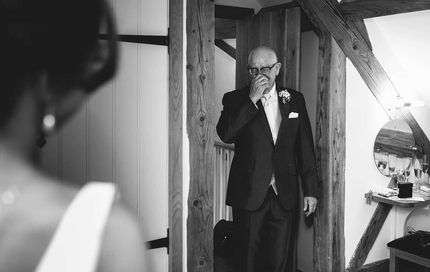 the father of the bride enters the room