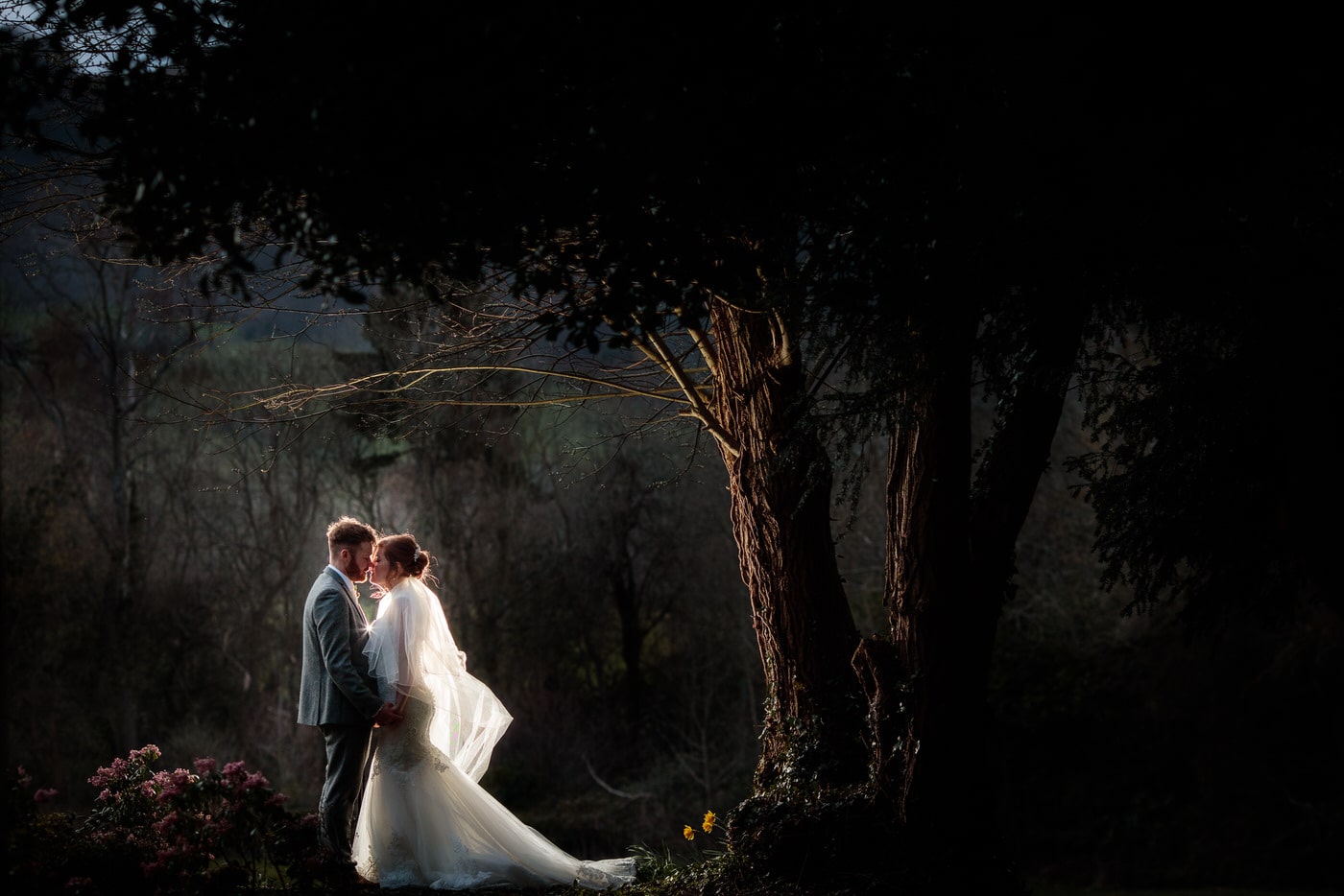 at a Tyn Dwr Hall Wedding a bride and groom share a tender moment