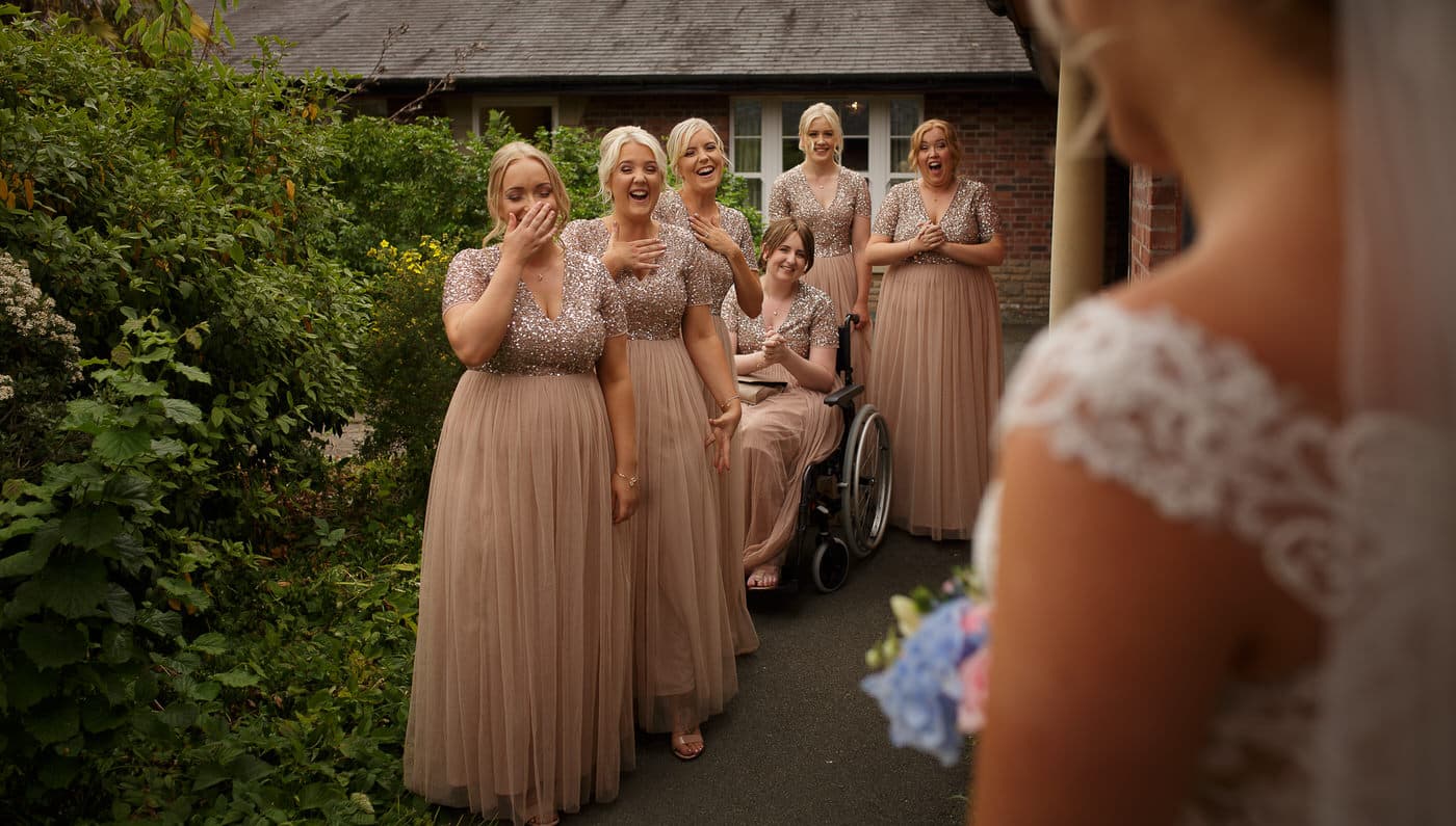 the beautiful bride and her party of bridesmaids at Netley Hall in Shropshire