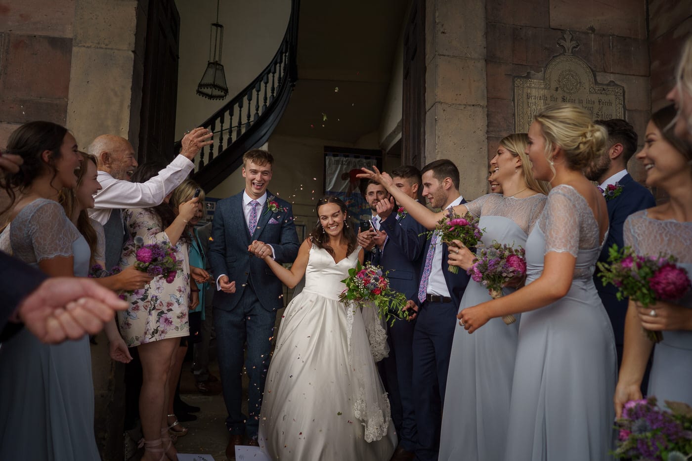 shropshire bride and groom leaving church in Whitchurch