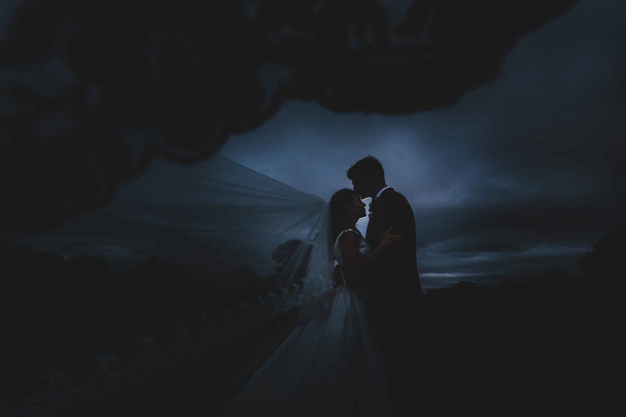 creative image of bride and groom by wedding photographer in shropshire