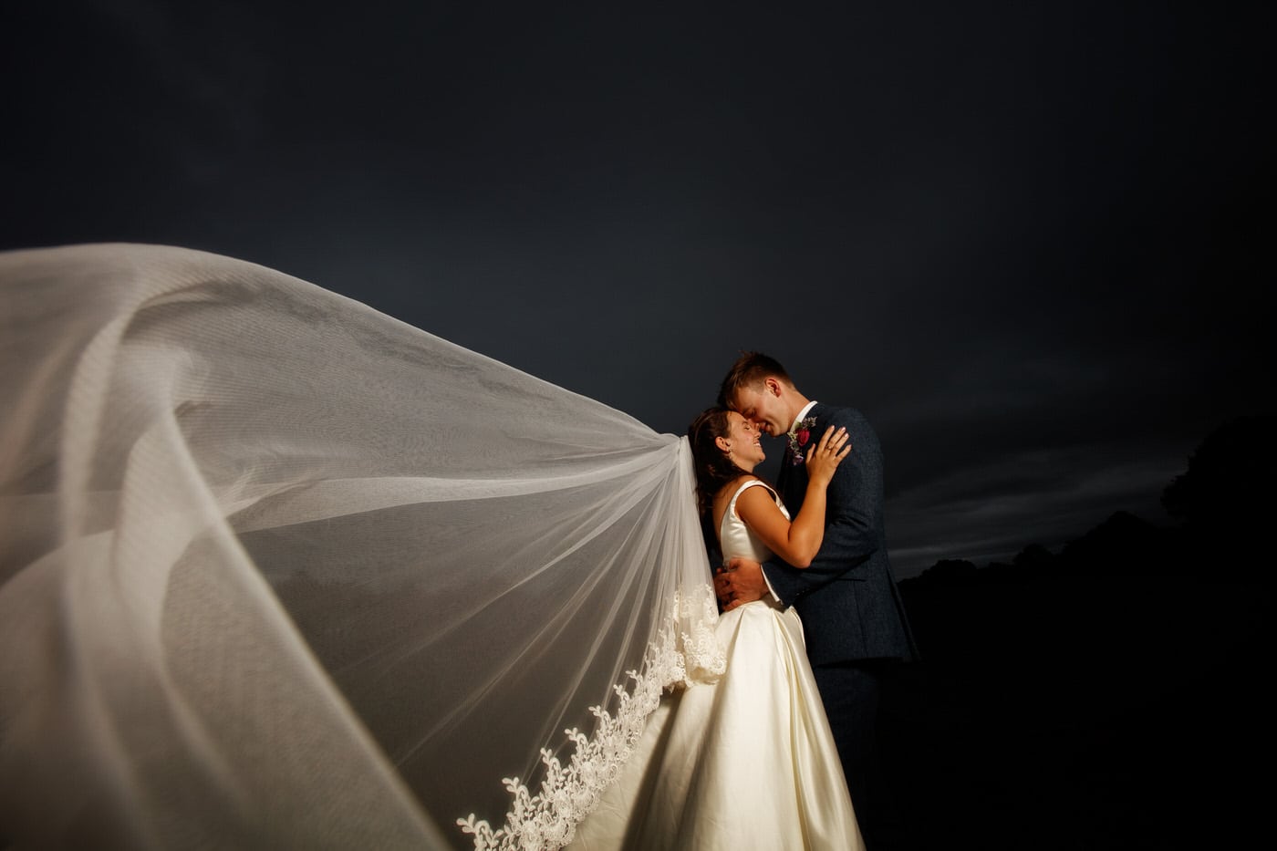wedding photographer shropshire captures creative portrait of bride and groom St Alkmunds Church Wedding