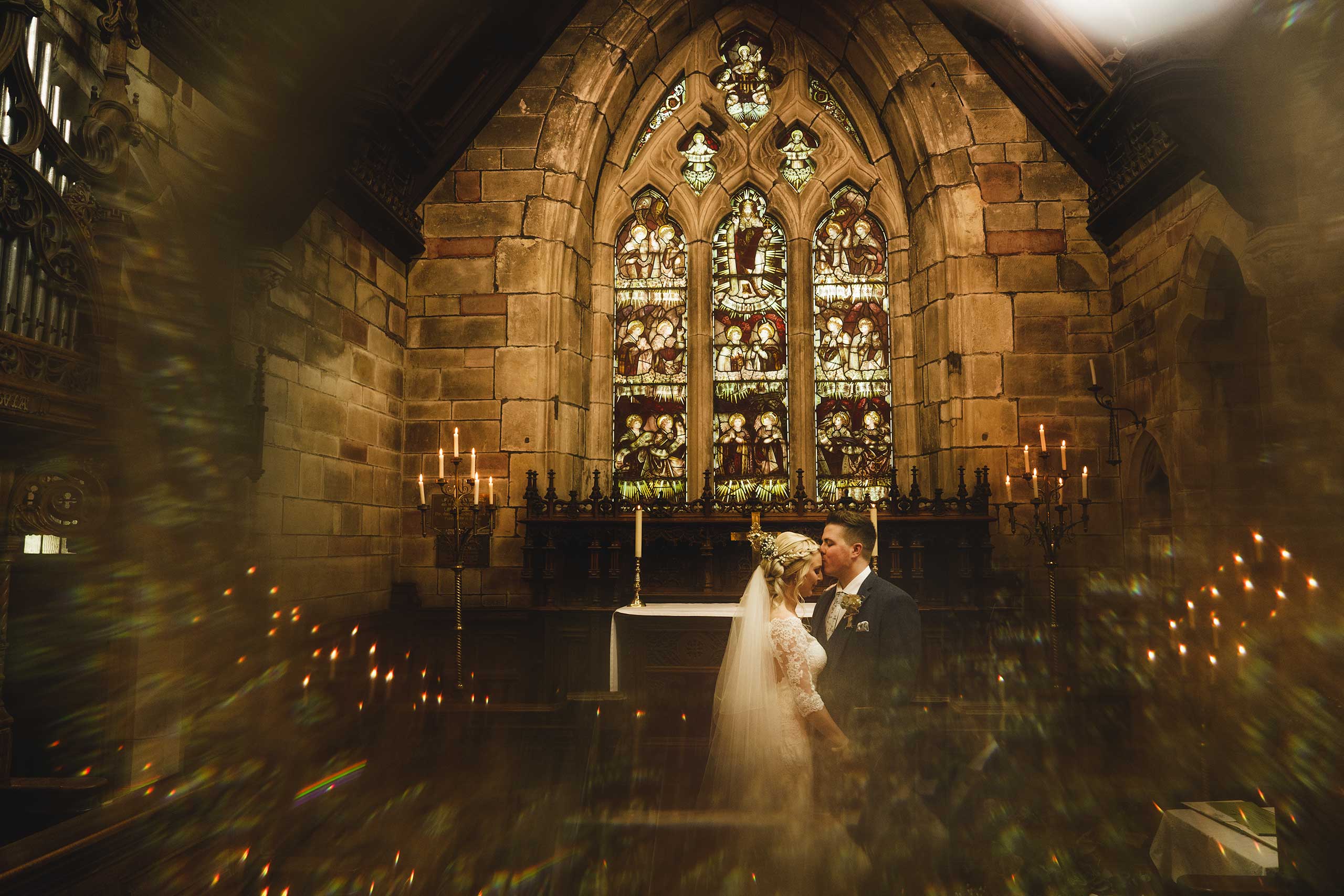 bride and groom take time out in a shrewsbury church