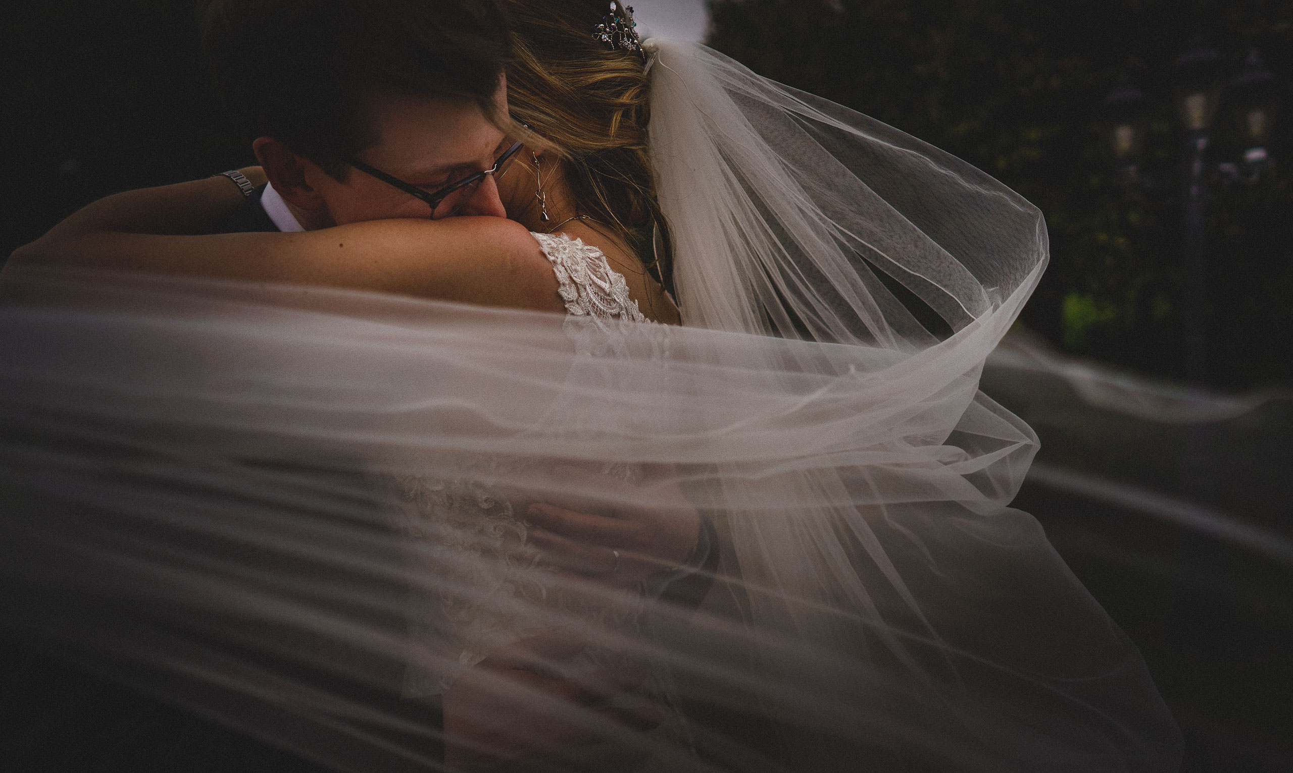 a beautiful moment as the bride and groom embrace