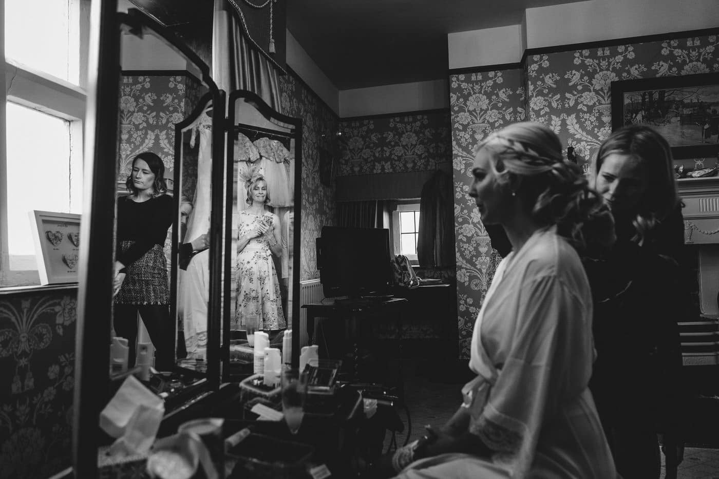 reflection of bride's mother at soulton hall