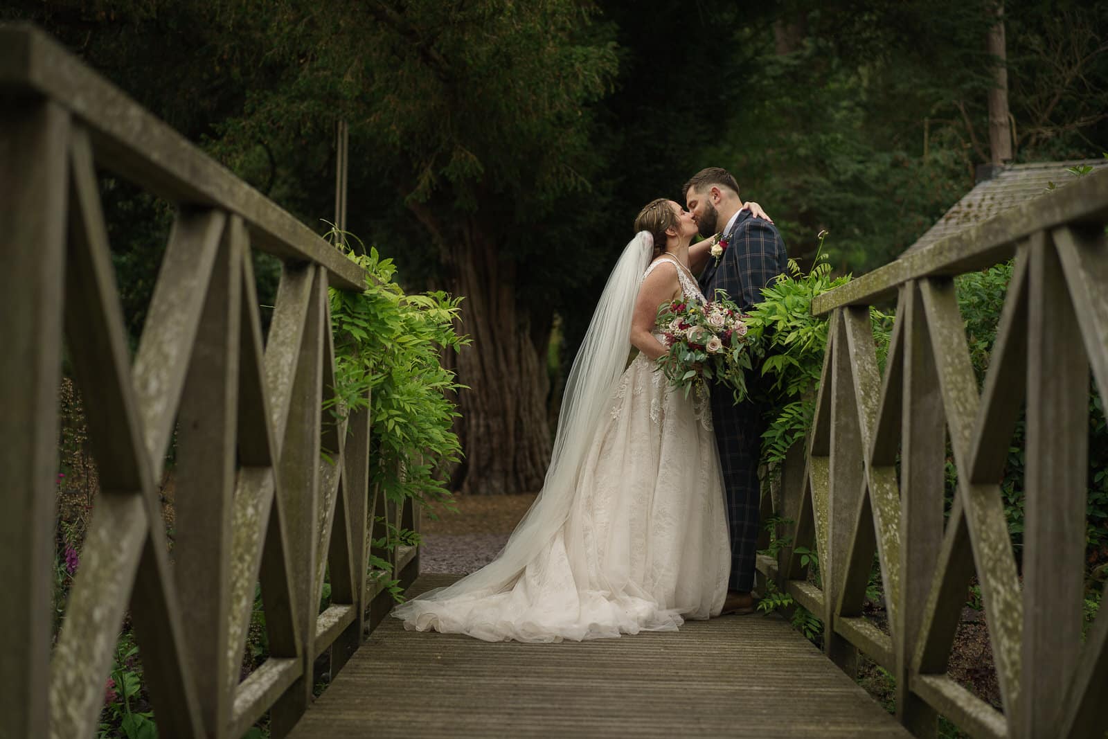 A bride and groom take some time out at the wonderful Tyn Dwr Hall in Llangollen, North Wales