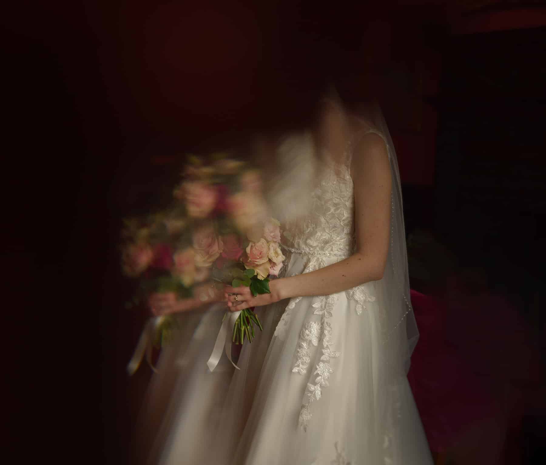 A black and white photo of a woman's hands at a Shropshire wedding.
