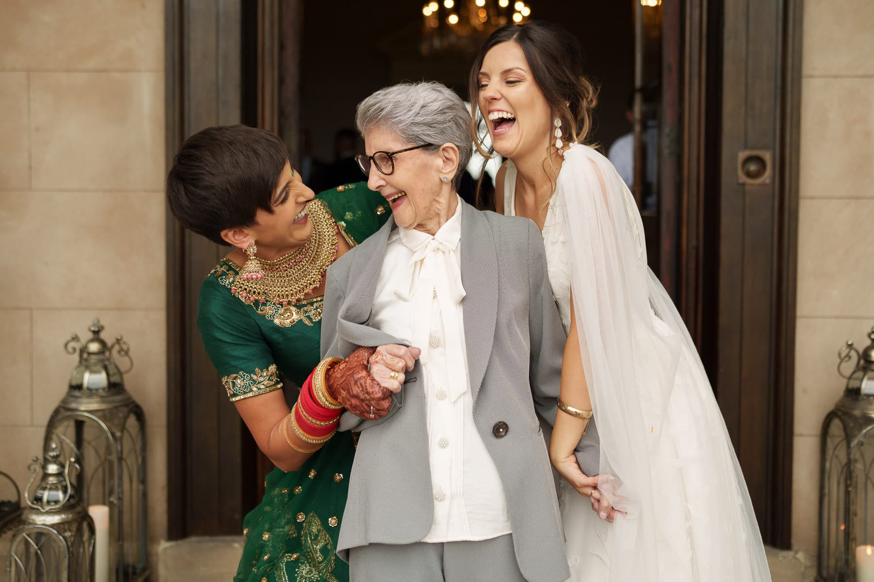 Indian bridesmaids laughing with an Indian grandma at a Davenport House wedding.