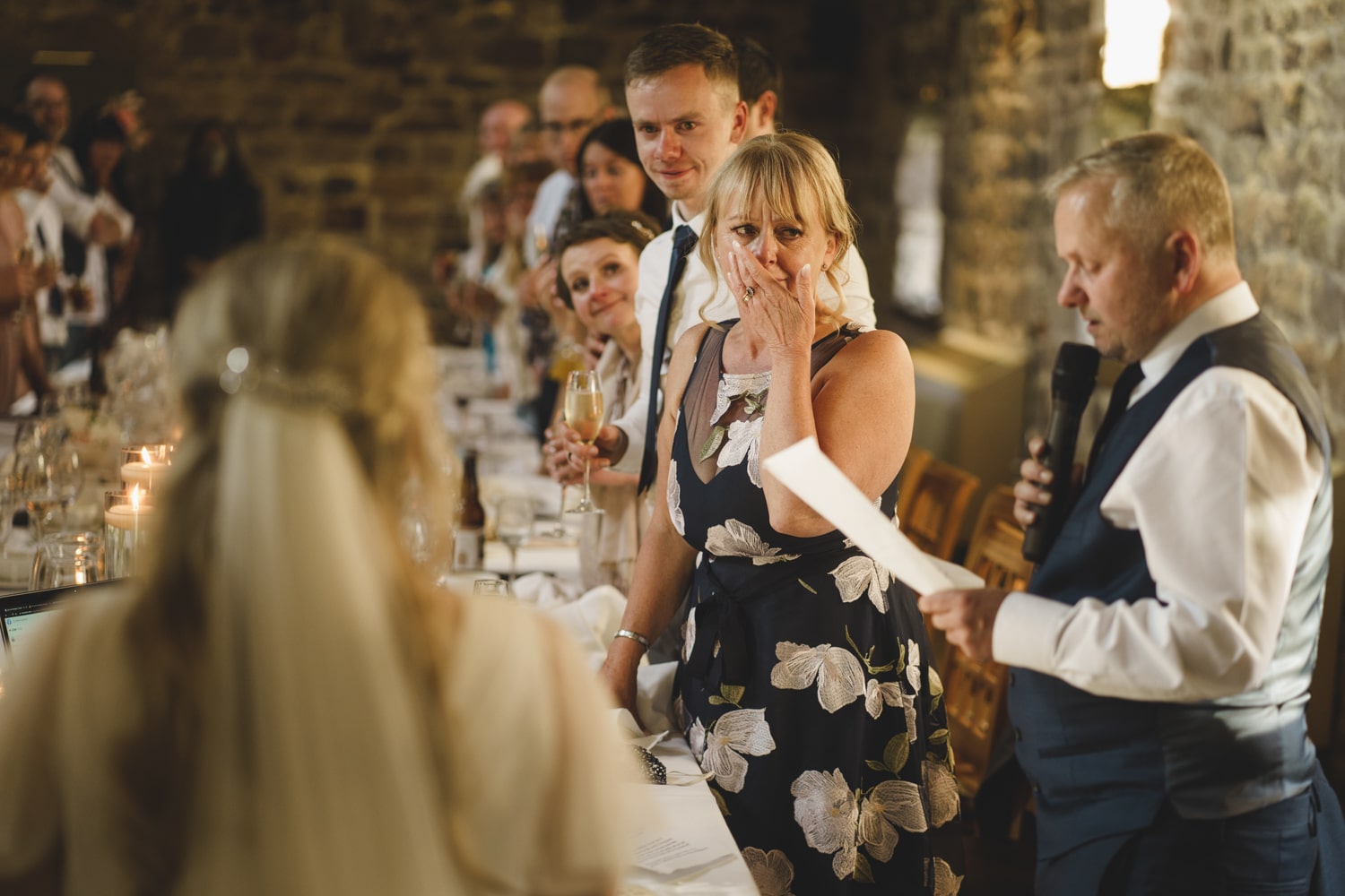 a bride and groom at a wedding reception.