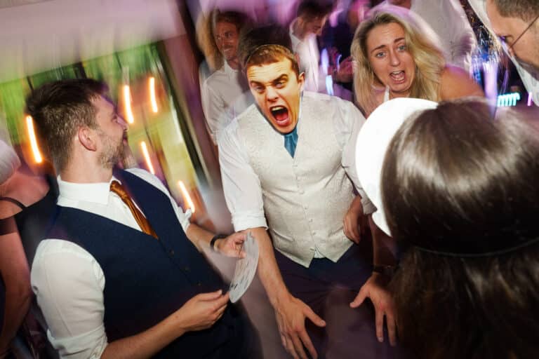 a lively group of people at a foxtail barns party.